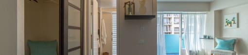 Waikiki Walina Apartments living area with closet storage and decor