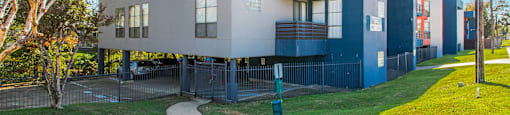 a modern house with a sidewalk in front of it