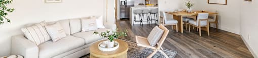 a living room with a couch and a table