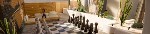 A chess board with pieces on it is in the middle of a patio.