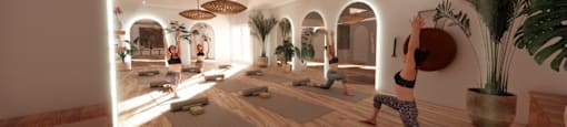 A yoga class is taking place in a spacious room with wooden floors and natural light.