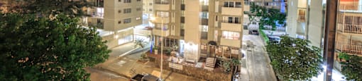 Waikiki Walina Apartments exterior building at night 