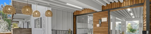 A modern interior with a wooden door and a staircase.
