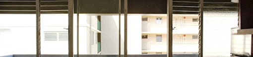 Waikiki Walina Apartments glass windows and doors to the balcony