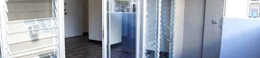 Waikiki Walina Apartments balcony with glass doors