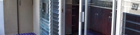 Waikiki Walina Apartments balcony with glass doors