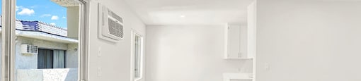 A room with a window and a door leading outside at Bonnie Brae Apartments, Los Angeles, California