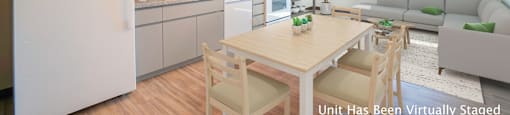 A modern kitchen with a dining table and chairs in the foreground.