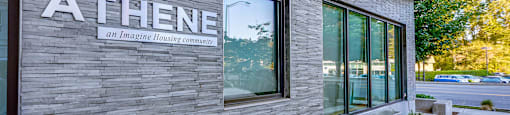 A building with the word Athene on it.