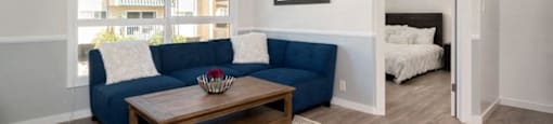 a living room with a couch and a coffee table
