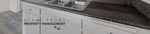 A kitchen with a sink and cabinets.