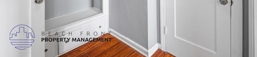 a niche in the wall of a closet with an open door