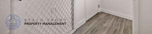 A white door with a black handle is closed.