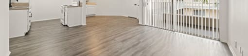 a row of white benches on a wooden floor with white triangles