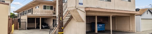 A two-story house with a garage is for sale.