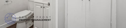 A white bathroom with a toilet and a cabinet.