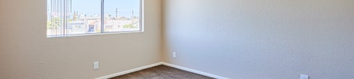 the living room and dining room of an empty beach front property