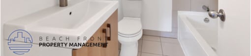 a bathroom with a sink and a toilet and a mirror