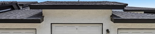 Three garage doors are closed and labeled A, B, and C.