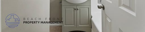 a bathroom with a sink and a mirror and a toilet