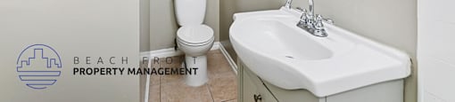a bathroom with a sink and a toilet and a mirror