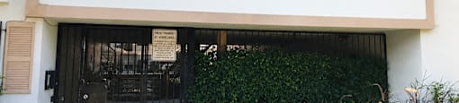 The front of a building with a sign that says "Eight Day Eight".