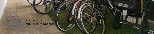 A bicycle is parked on a balcony.
