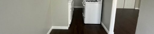 A laundry room with a washer and dryer.