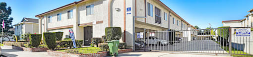 A building with the words Beach Front Property Management on the side.