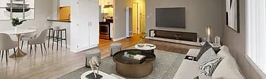 A modern living room with a grey sofa and a coffee table.