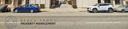 Two buildings with cars parked in front and a sign that says "Beach Front Property Management".