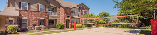 Volleyball court  at Parmer Place Apartments in Austin