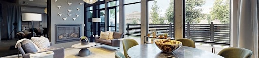 A modern dining room with a large table and chairs.