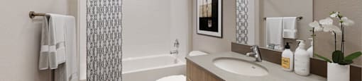 A bathroom with a toilet, sink, and shower.