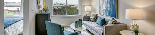 living room with beautiful green chairs at Brixton South Shore, Austin, 78741