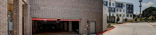 garage door opened entrance at Brixton South Shore, Texas, 78741
