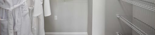 a walk in closet in a 555 waverly unit