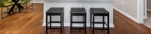 a kitchen and dining area in a 555 waverly unit
