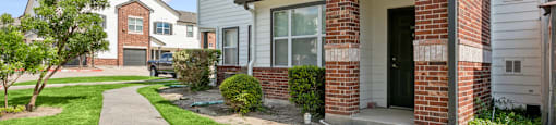 A brick building with a sign that says "1234" on it.