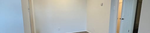 a skylight in the ceiling of a room with a white table and a