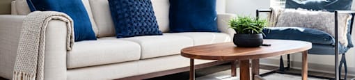 a living room with a couch and a table