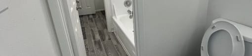 a small bathroom with a toilet and a shower