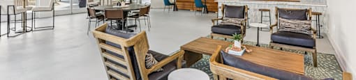 A large room with a lot of chairs and tables.