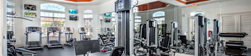 Gym with weights equipment at Rapallo Apartments  in Kissimmee, Florida