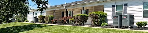 Green space and apartments at High Pointe Club.