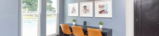 a dining room with a table and four chairs at Cadence Apartments, Roy, 84103