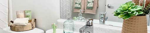 a white bathroom with a sink and a mirror at Cadence Apartments, Utah, 84067