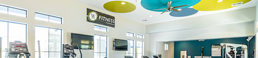 Fitness room with cardio equipment at CHANDLER APARTMENT HOMES, Las Vegas, NV
