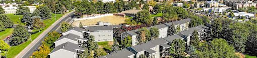 an aerial view of apartments with mountains in the background at Mountain Run Apartments, UT, 84058