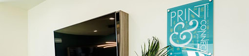 Office area with printer and TV at THE RISE APARTMENT HOMES, Las Vegas, NV
